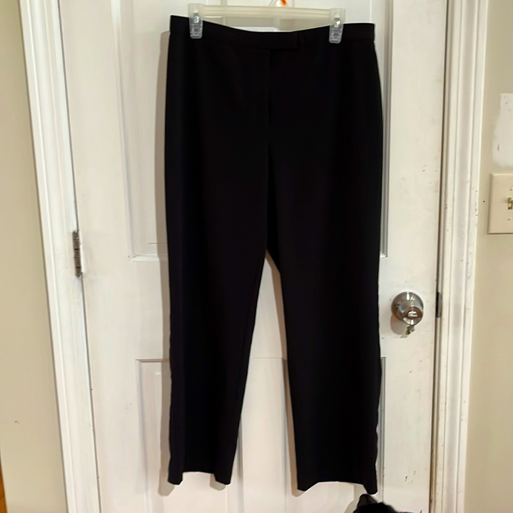 Black stretch petite black flat front slacks. Wash and wear great. Size 12p